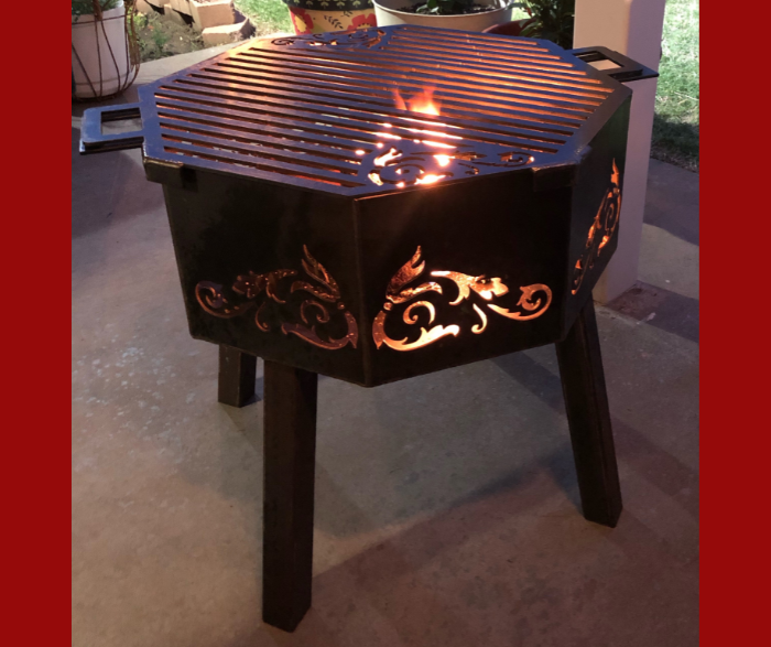 Custom Steel - Metal Fabrication & Custom Welded Fire Pits on legs with floral vine scrolls on the side anda matching cook top designed nd built by HL Guest Handmade