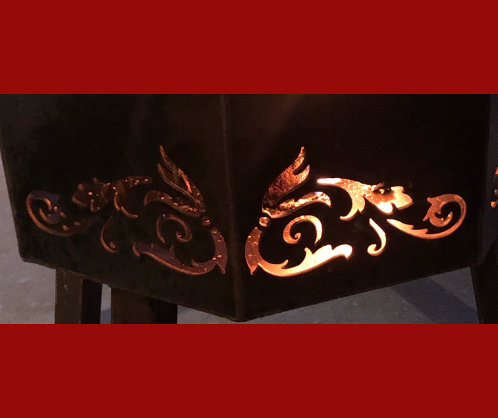 Custom Steel - Metal Fabrication & Custom Welded Fire Pits on legs with floral vine scrolls on the side anda matching cook top designed and built by HL Guest Handmade