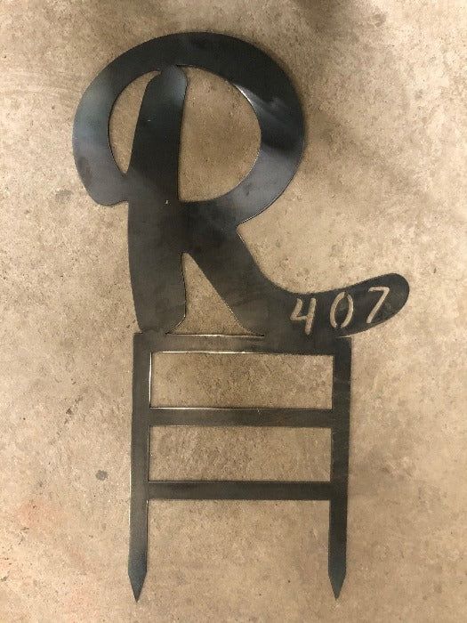 Metal cursive letter R with address number in the tail on stakes for a raised custom look designed and cut by HL Guest Handmade