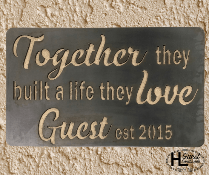 Personalized metal sign for valentines day that says "Together they built a life they Love" with last name and est. year designed and cut by HL Guest Handmade